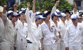 중국 노동자 들고양이 파업, 새 노동법 강제…“양날의 칼”