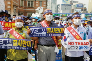 신동빈 불구속, 면세점 선정…사드 대가?